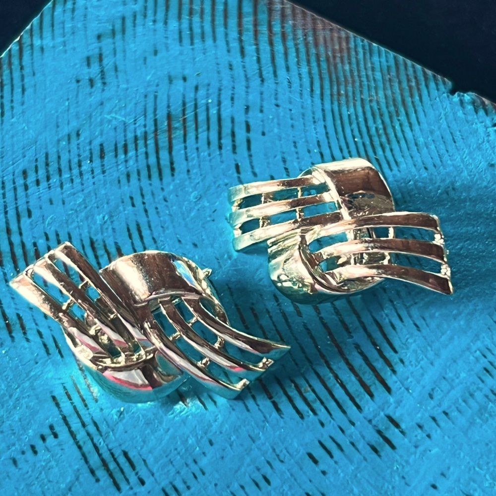 Mid Century Dramatic Gold Tone Clip On Earrings marked Cora